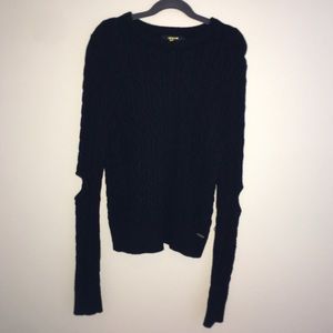 Black sweater with open elbows